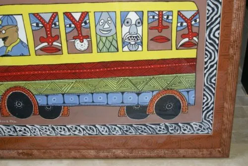 RARE UNIQUE COLORFUL  FOLK ART PAINTING PAPUA NEW GUINEA HUMOROUS ARTIST: TRIBAL WARRIORS TRAVELLING BY BUS & FRAMED IN SIGNED HAND PAINTED FRAME TO MATCH THE ART DESIGNER COLLECTOR WALL CARTOON  ART  38" X 27” HUGE DFP1